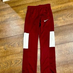 Maroon Nike pants